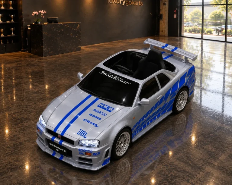 Mini Nissan Skyline GT-R Electric Go Kart in Silver with Blue Street Livery, front three-quarter view